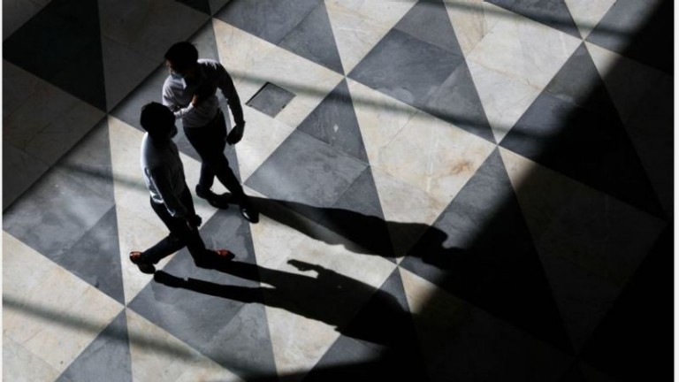 Two people walking 